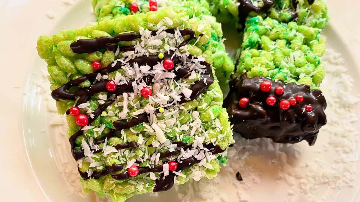 Green rice krispies with chocolate and red candy balls.