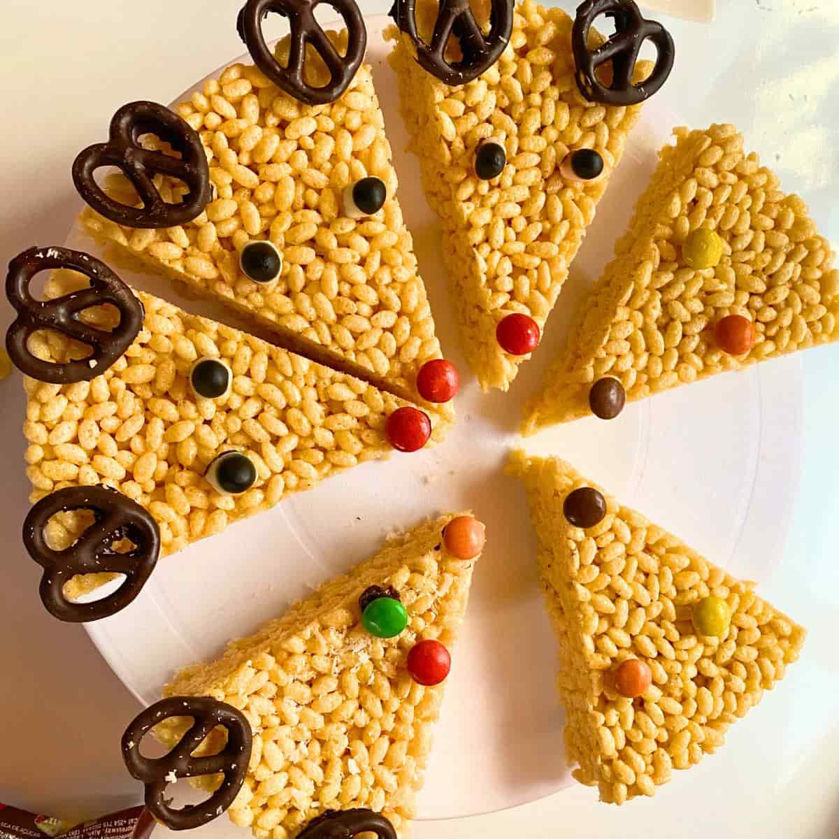 Reindeer Rice Krispies Treats on a white surface.