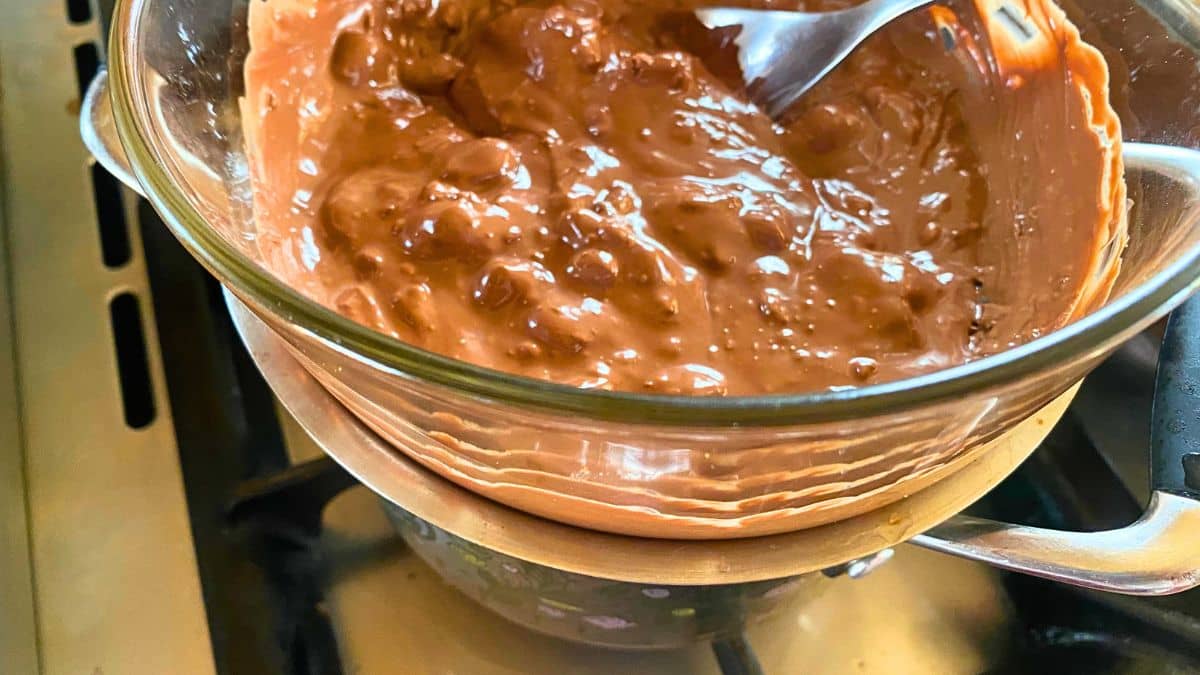A bowl of brown cake mix.