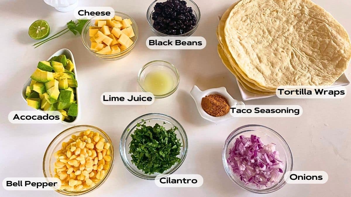 A bunch of Quesadilla ingredients in glass bowls.