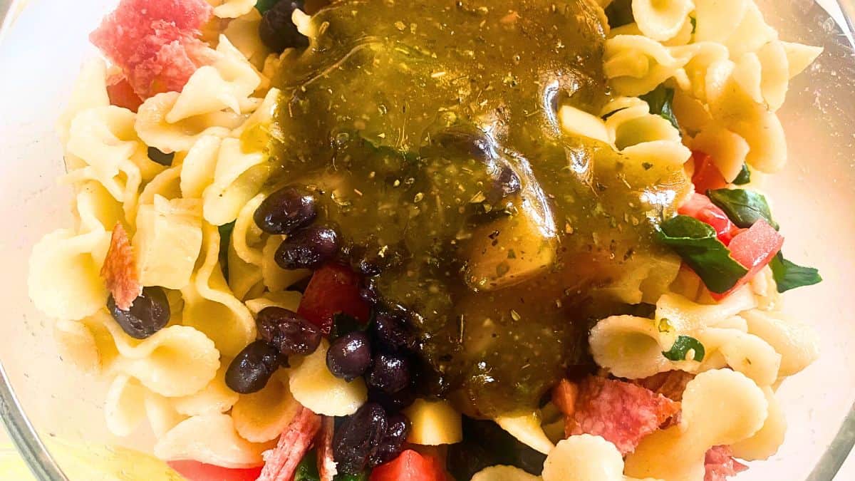 A close up of pasta with sauce on it.
