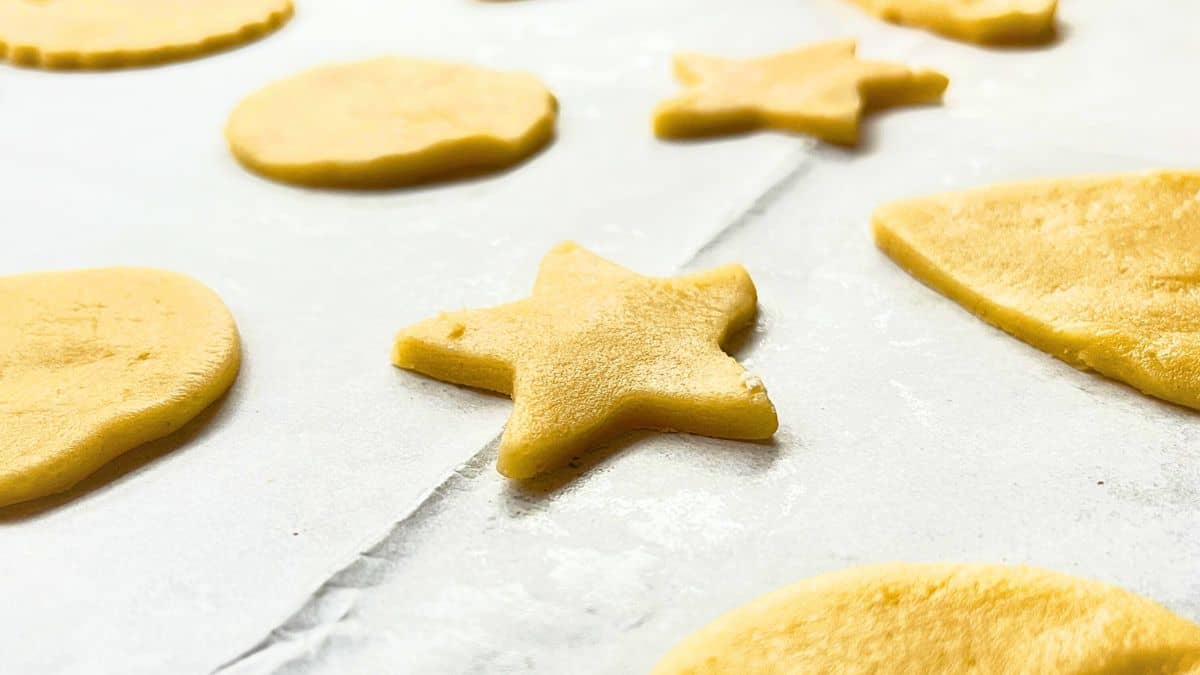 A close up of shapes of cookie dough.